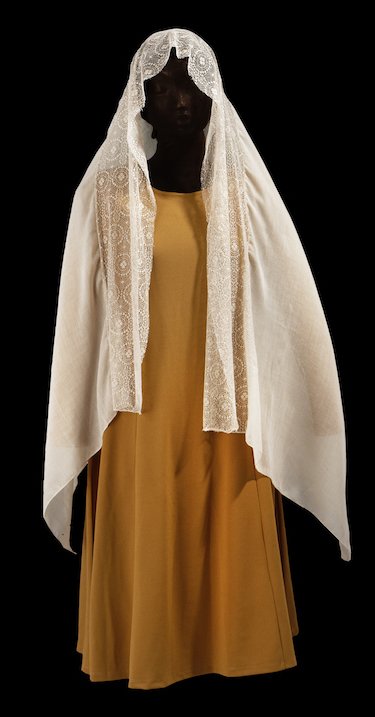 Traditional Orthodox Jewish woman's outfit for the Sabbath. TRC 2017.0135 (shawl) and TRC 2017.0136 (dress). Click the illustration for the TRC catalogue entry for the shawl. Traditional Jewish woman's outfit for the Sabbath.