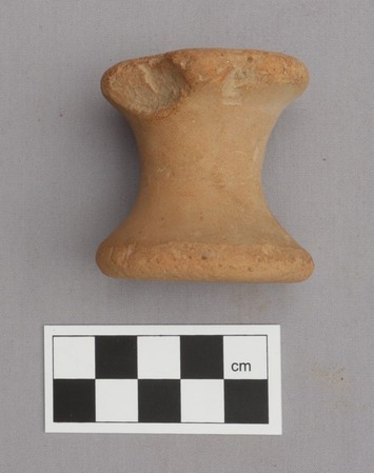 Ancient Greek bobbin made of clay, 