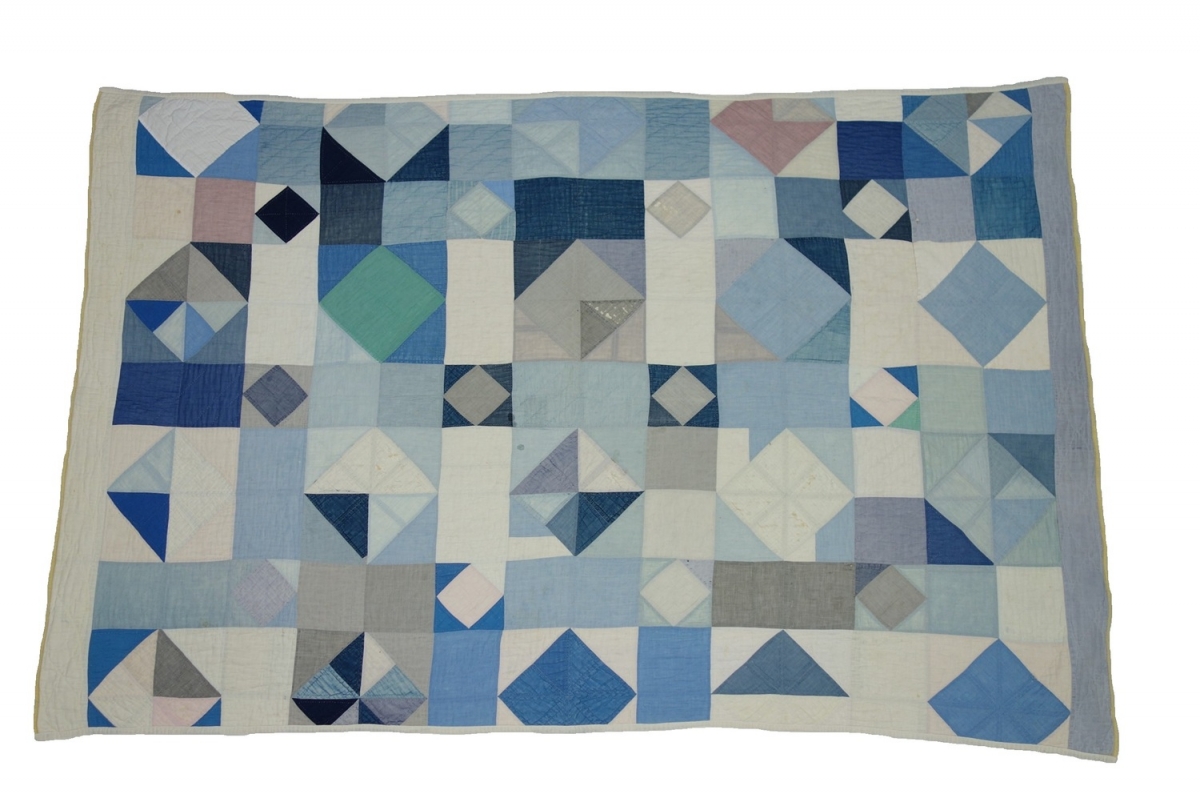 Mennonite relief quilt made in North America and sent to Europe as humanitarian aid for Mennonite refugees from the Ukraine, after the Second World War.