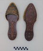 Pair of modern, hand-embroidered mules from India (TRC 2018.0378a-b).