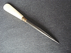 Victorian-era needlework stiletto with bone handle.