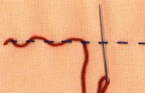 Example of a threaded running stitch.