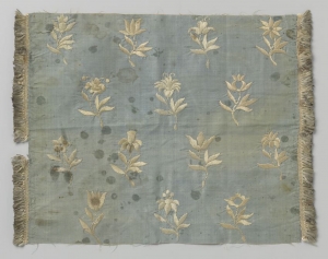 Embroidered blue silk with white floral embroidery, c. 1630