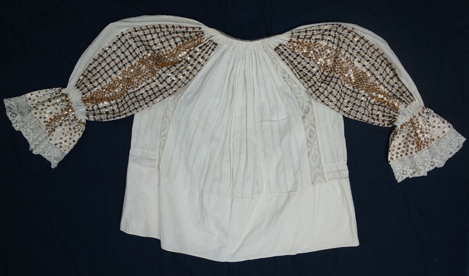 A hand embroidered woman's wedding blouse from Croatia, early 20th century. This blouse was the first external donation to the TRC Collection, which was started in 1997 (TRC 1997.0067).