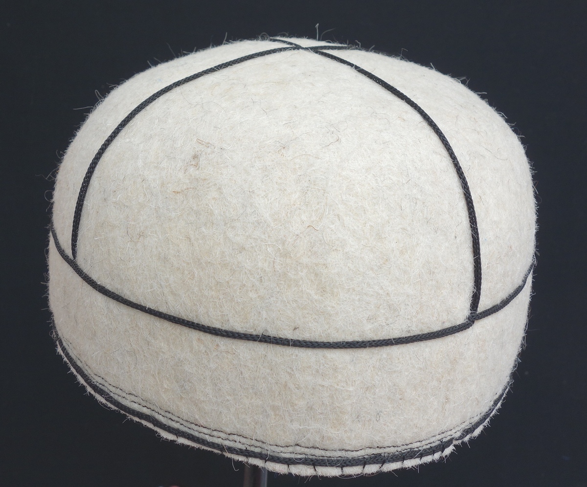 A white felt hat from the Svan in northwestern Georgia, early 21st century (TRC 2015.0344).
