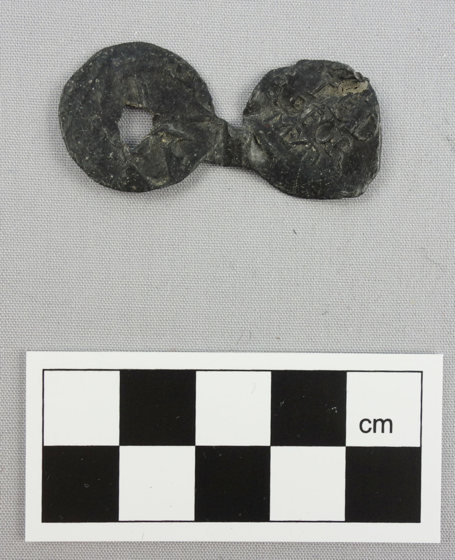 Opened seal with the text: "WORSTED REFORMED" on one side. Norfolk, 17th century (?) (TRC 2016.0111).