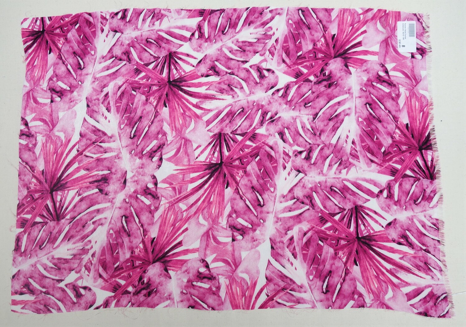 Piece of satin with a printed design of stylised flowers, sold online by a Dutch firm as velvet (TRC 2020.2506).