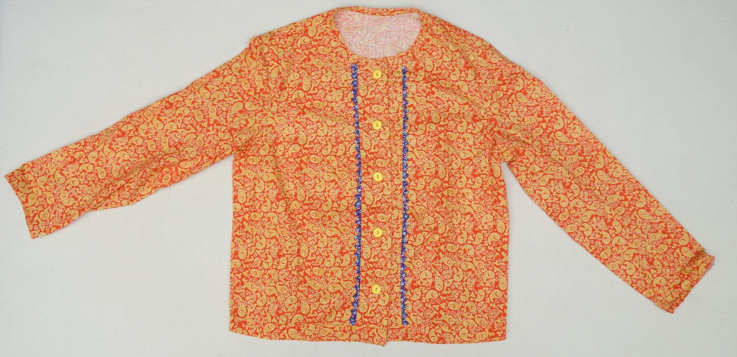 Long-sleeved everyday blouse decorated with paisley motifs, Kihnu island, Estonia, early 21st century (TRC 2021.0408c).