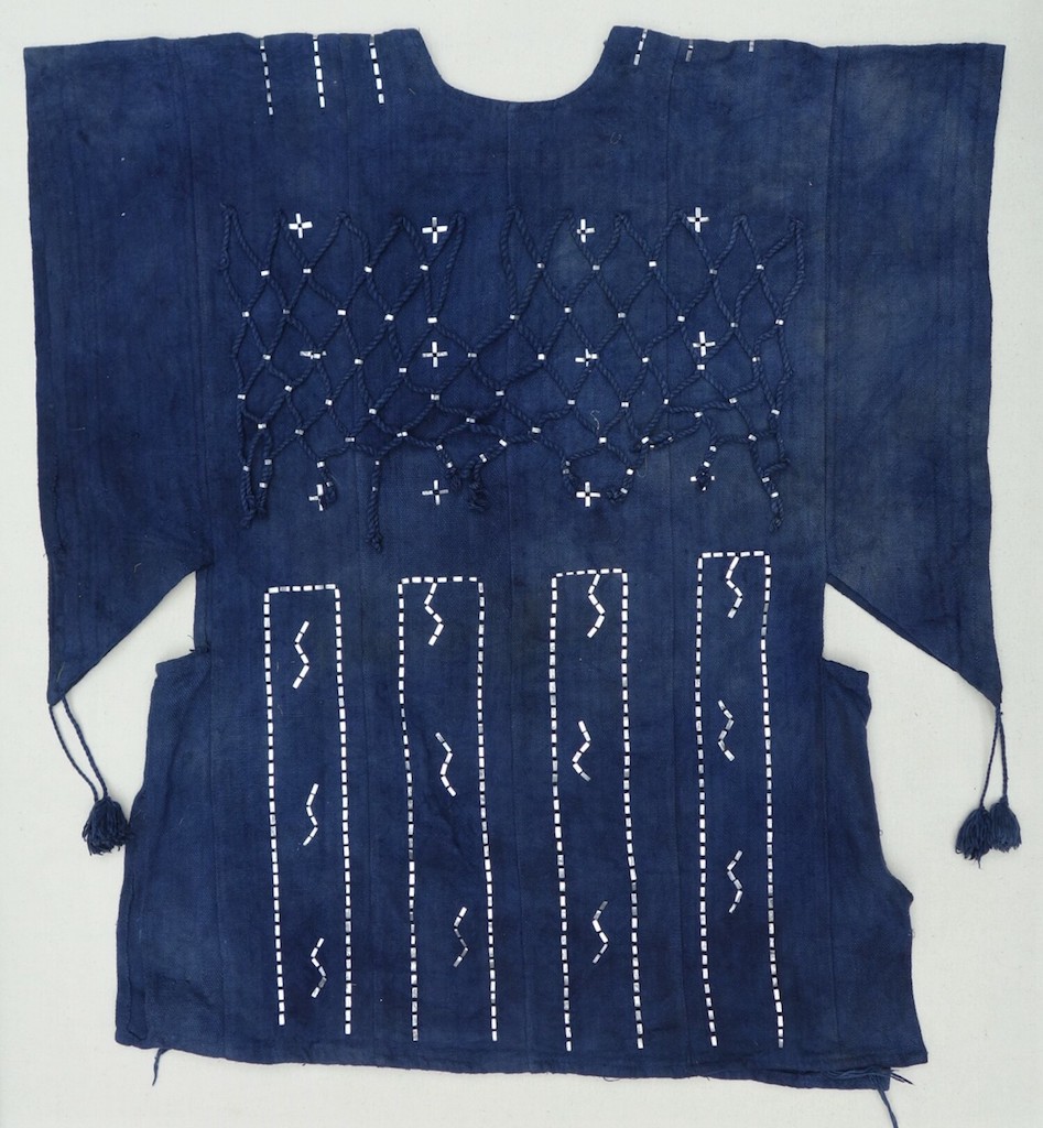 Back of a tunic decorated with metal thread embroidery. Dogon, Mali, late 20th century (TRC 2021.2163).