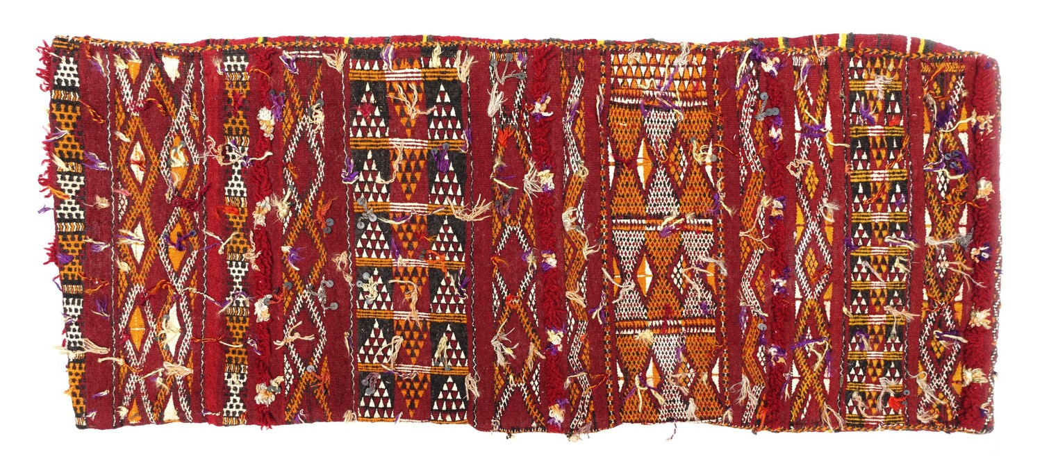 A piece of cotton and woollen cloth, with metal tassels and sequins. Moroccan, mid-20th century, from the Arizona donation recently added to the TRC collection recently donated to the TRC (TRC 2022.1627).