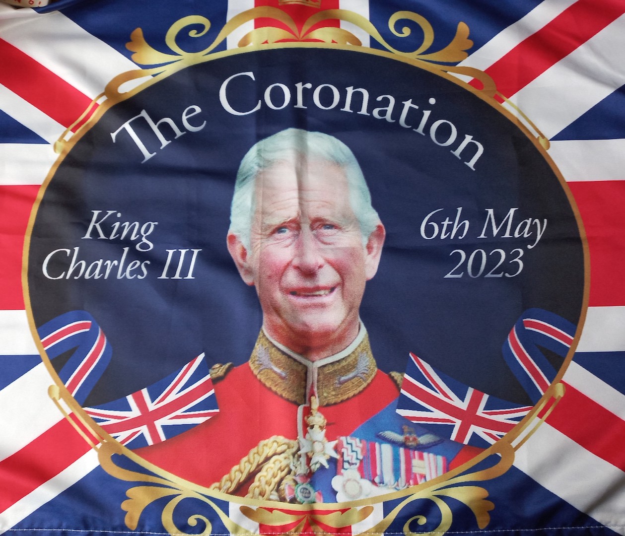 Union Jack with a somewhat bewildered looking King Charles (TRC 2023.0680).