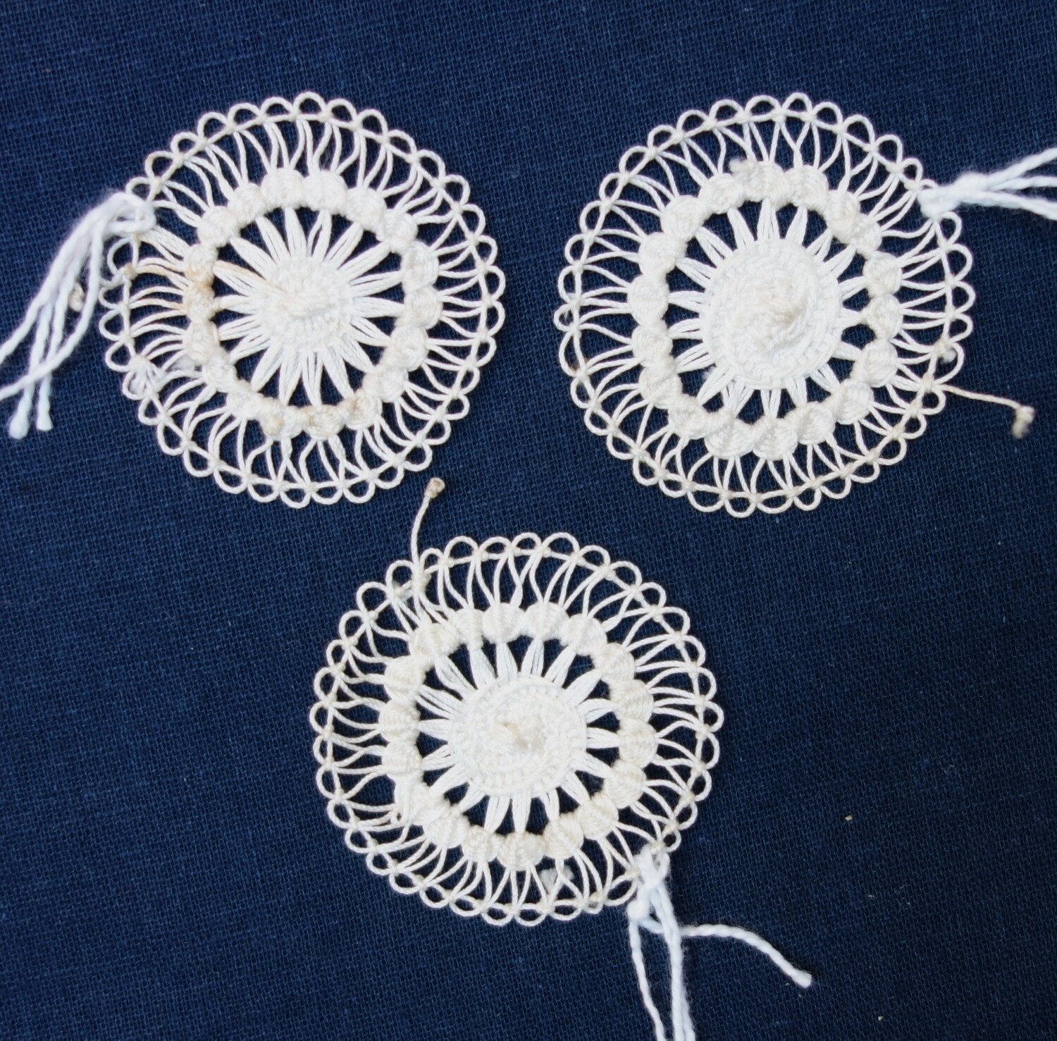 Three identical Tenerife lace circles with a central wheel. The Netherlands, early 20th century (TRC 2023.2603a-c).