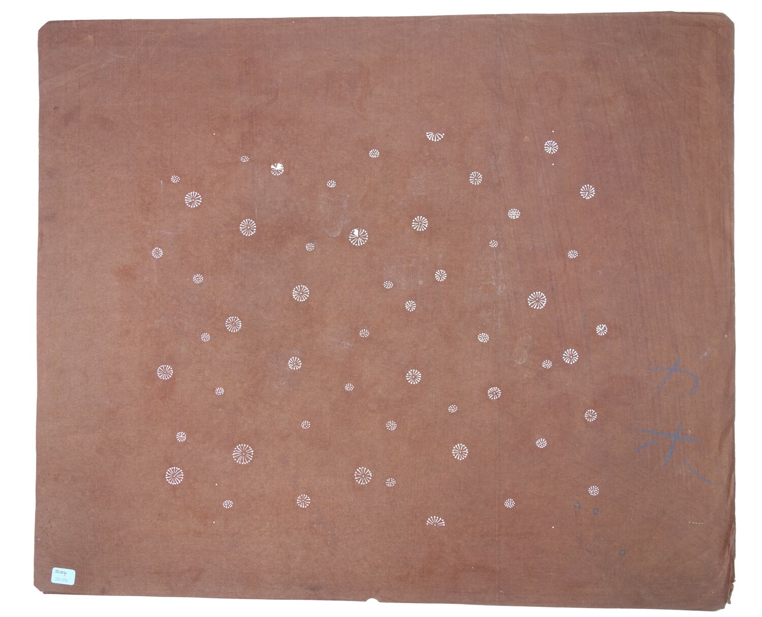 Stencil with a pattern of small, individual flower heads of varying sizes, all made from small dots and lines. Japan, 20th century (TRC 2024.2038).