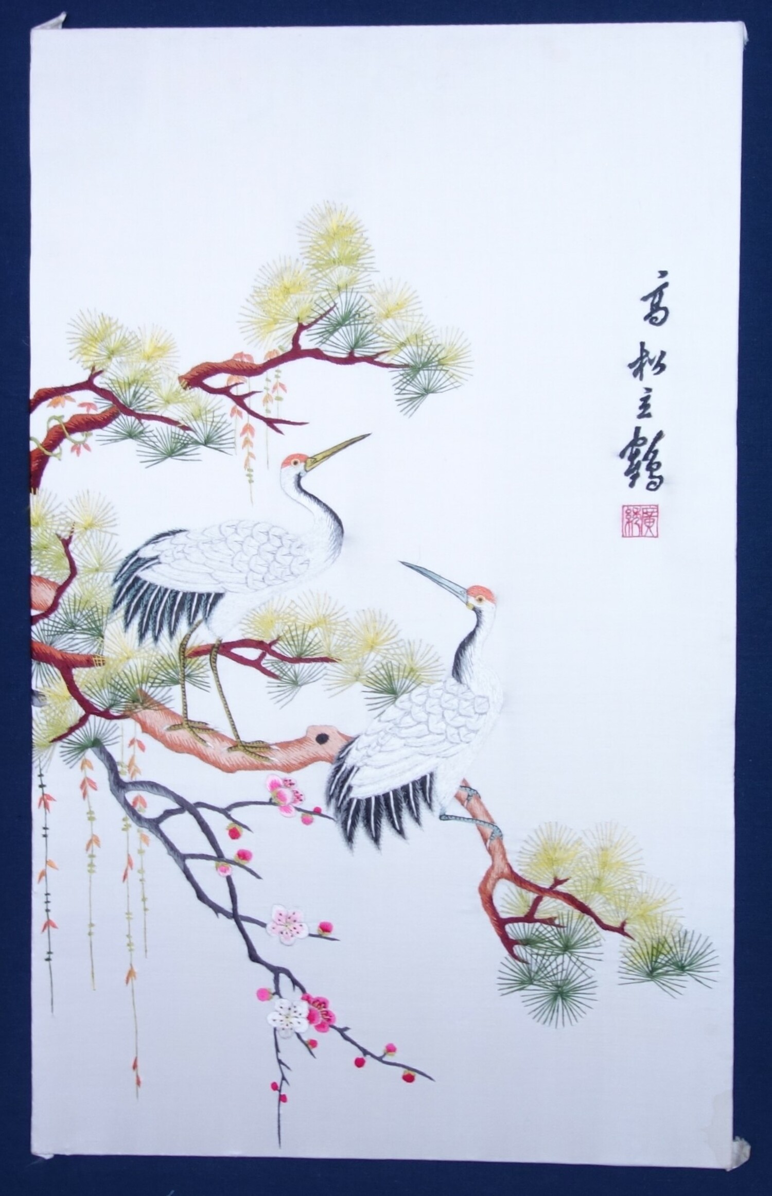 Fig. 2. An example of Suzhou (Su Xiu) embroidery with a depiction of two cranes on the branches of a tree, along with a branch of cherry blossoms. China, early 21st century (TRC 2024.2940).