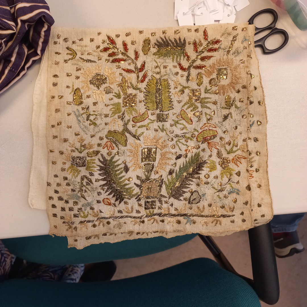 Late Ottoman silk and metal thread embroidery on a woman's sash, just removed from one of the boxes. Photograph by the author.