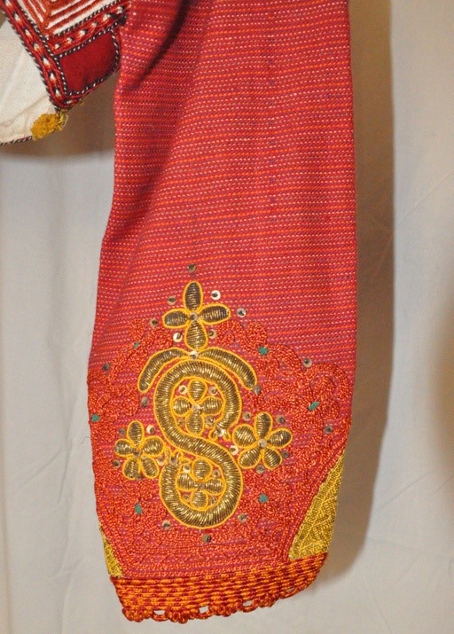 Hand embroidered sleeve of an Albanian garment. Part of the donation to the TRC.
