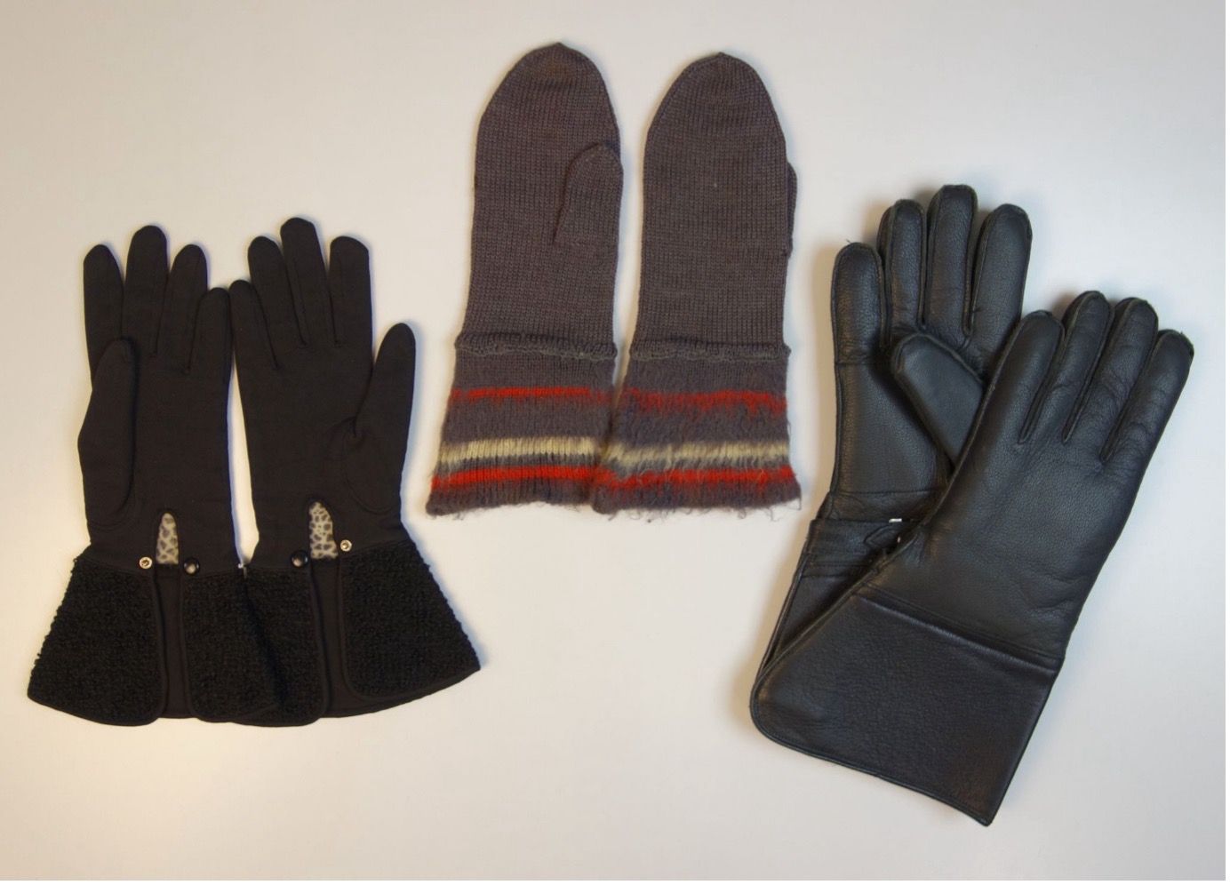 Fig 2: Left to right: a pair of gloves (TRC 2025.0641a-b), mittens (TRC 2007.0762a-b), and gauntlets (TRC 2025.0905a-b)