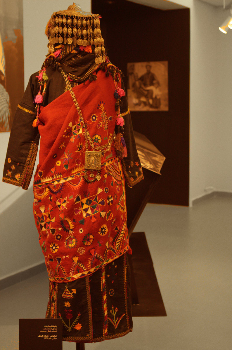 Charuga festival mantle, made in the 1930's, Qaraqosh, Iraq (Layla Pio collection), showing how the charuga is worn. Photograph by Fatima Abbadi, taken at the Tiraz Centre, Amman, Jordan.