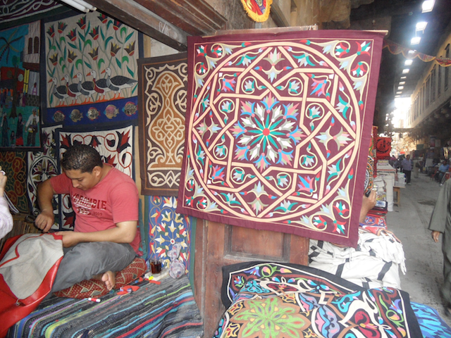 Craftsman at work in the Street of the Tentmakers, Cairo (2014). Photograph: author.