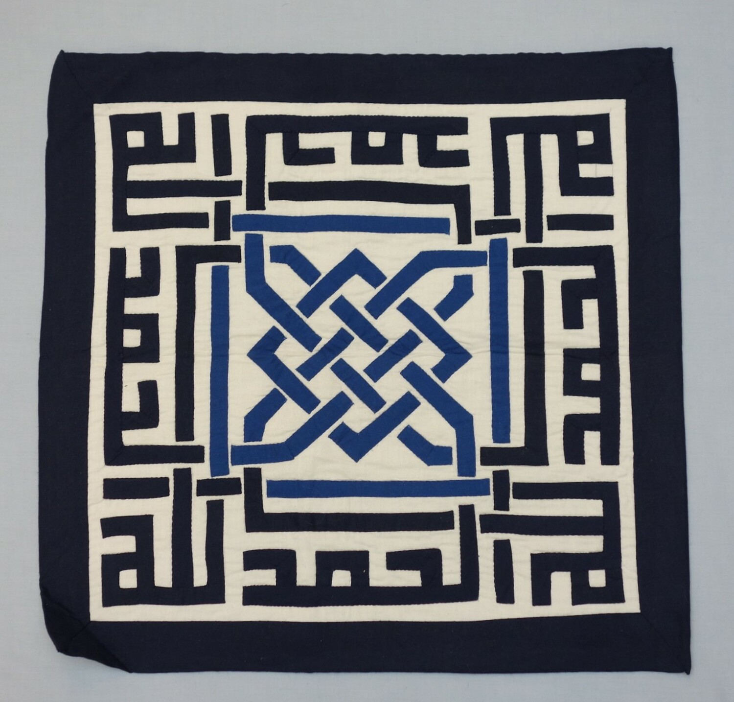 Khayamiya with "Praise to be God" in square Kufic script, Egypt, 2013 (TRC 2013.0614).