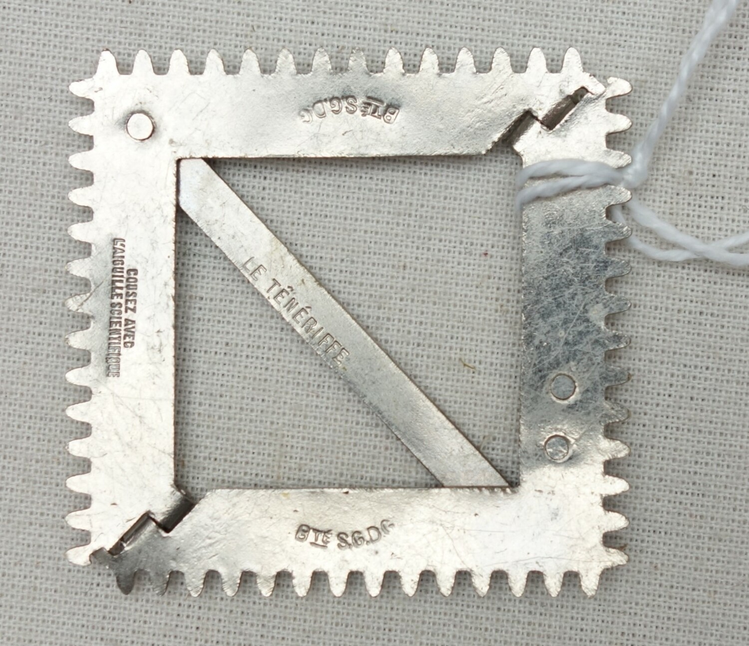 A square Tenerife lace frame, Europe, early 20th century (TRC  2023.2319).