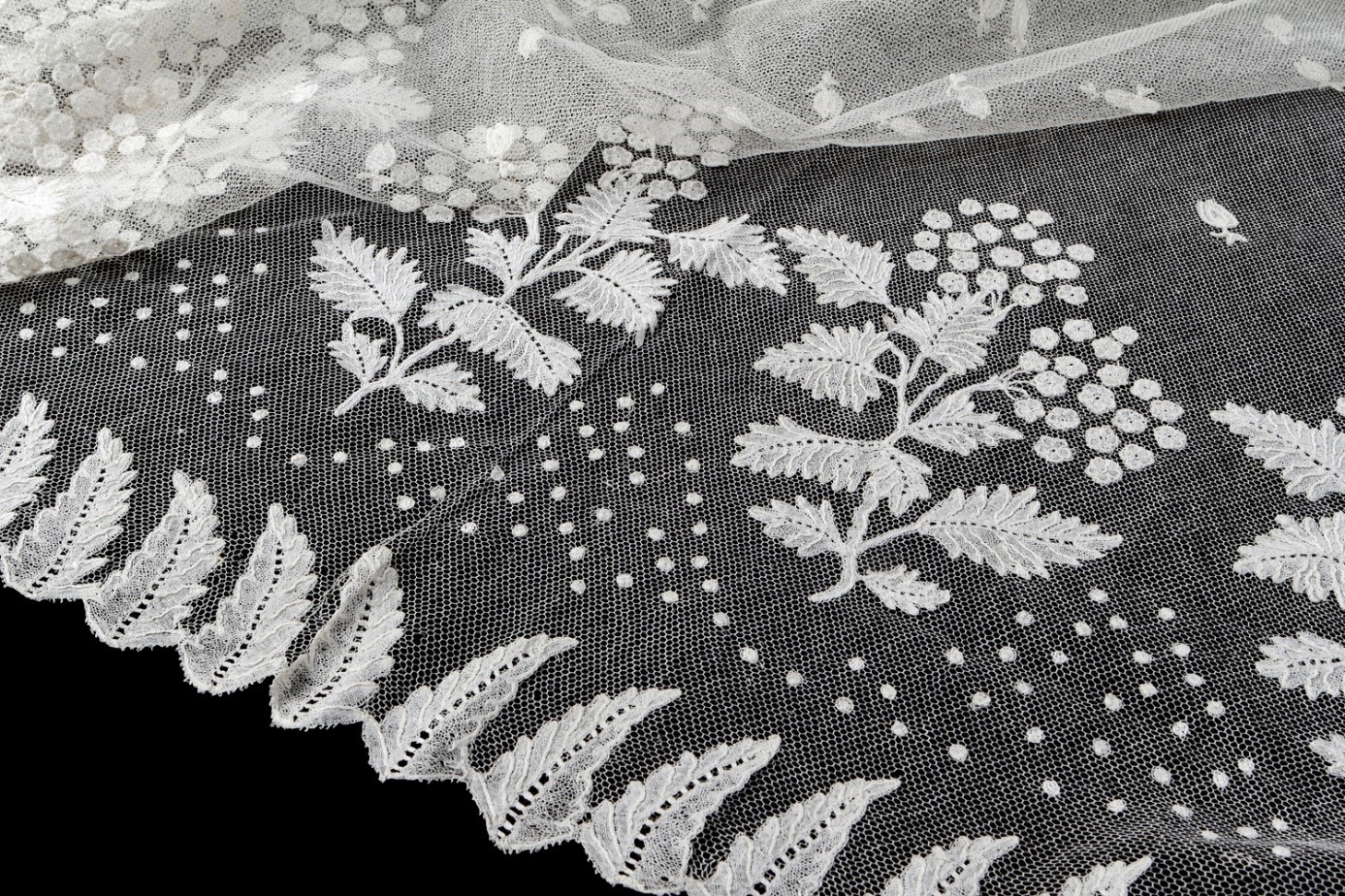 Detail of a Christening veil from Brussels, Belgium, c.1820 (TRC 2014.0831). Detail of a Christening veil from Brussels, Belgium, c.1820 (TRC 2014.0831).