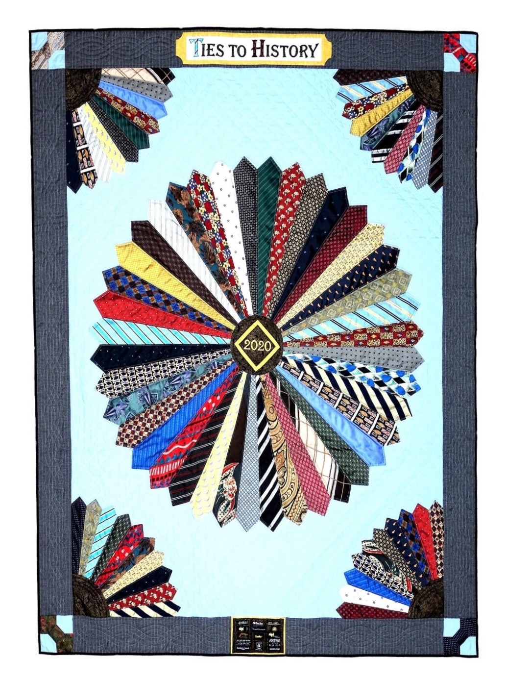 Quilt made by Beverley Bennett for the Ties to History exhibition. The main part of the quilt is made of men's ties.